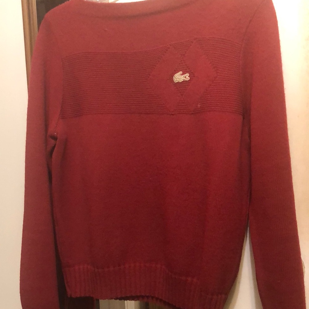 Women’s long sleeve sweater. No tags. Color is red. Size is Medium.
